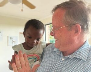 Andrew Killick of RC of Empagini with one of Butterflies patients