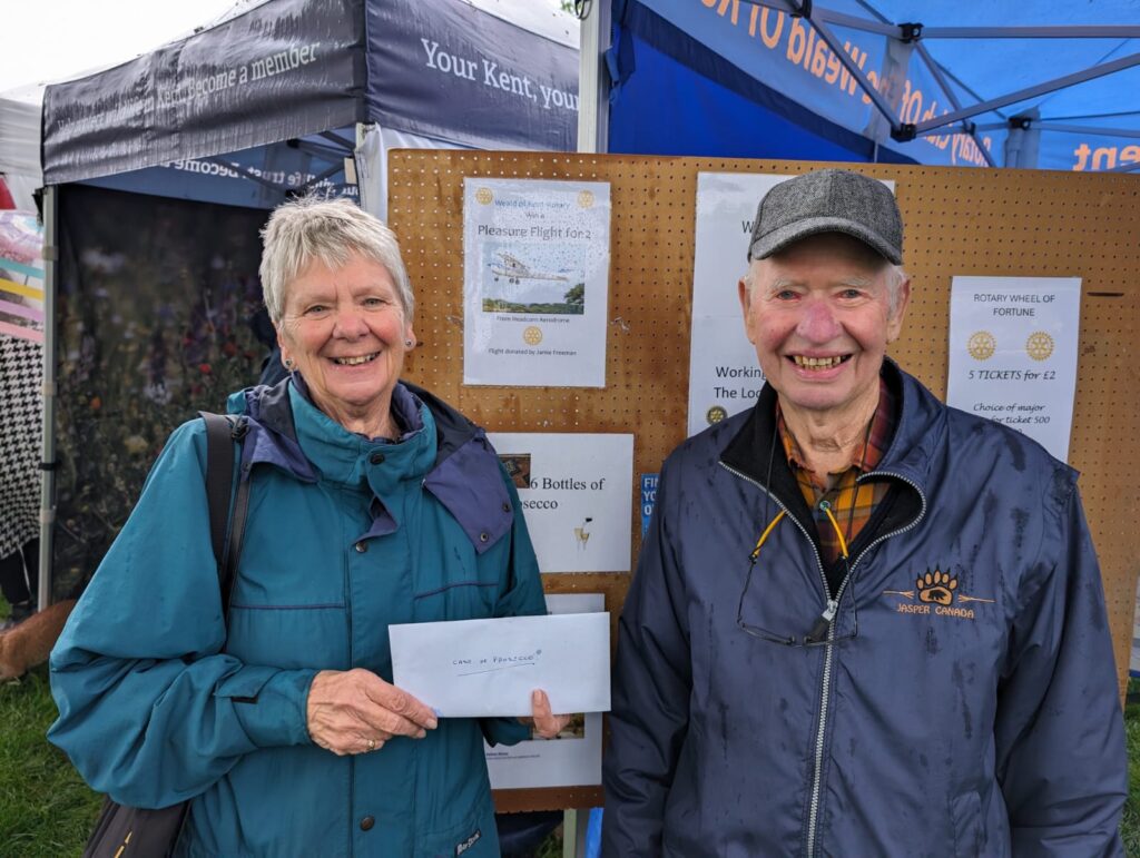 Shirley and Graham with their prize voucher